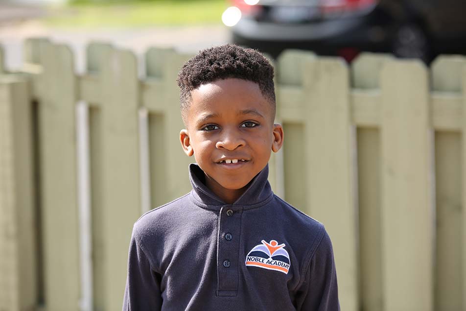students and teacher working in classroom